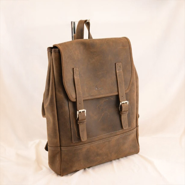 Brown leather backpack made from natural calfskin